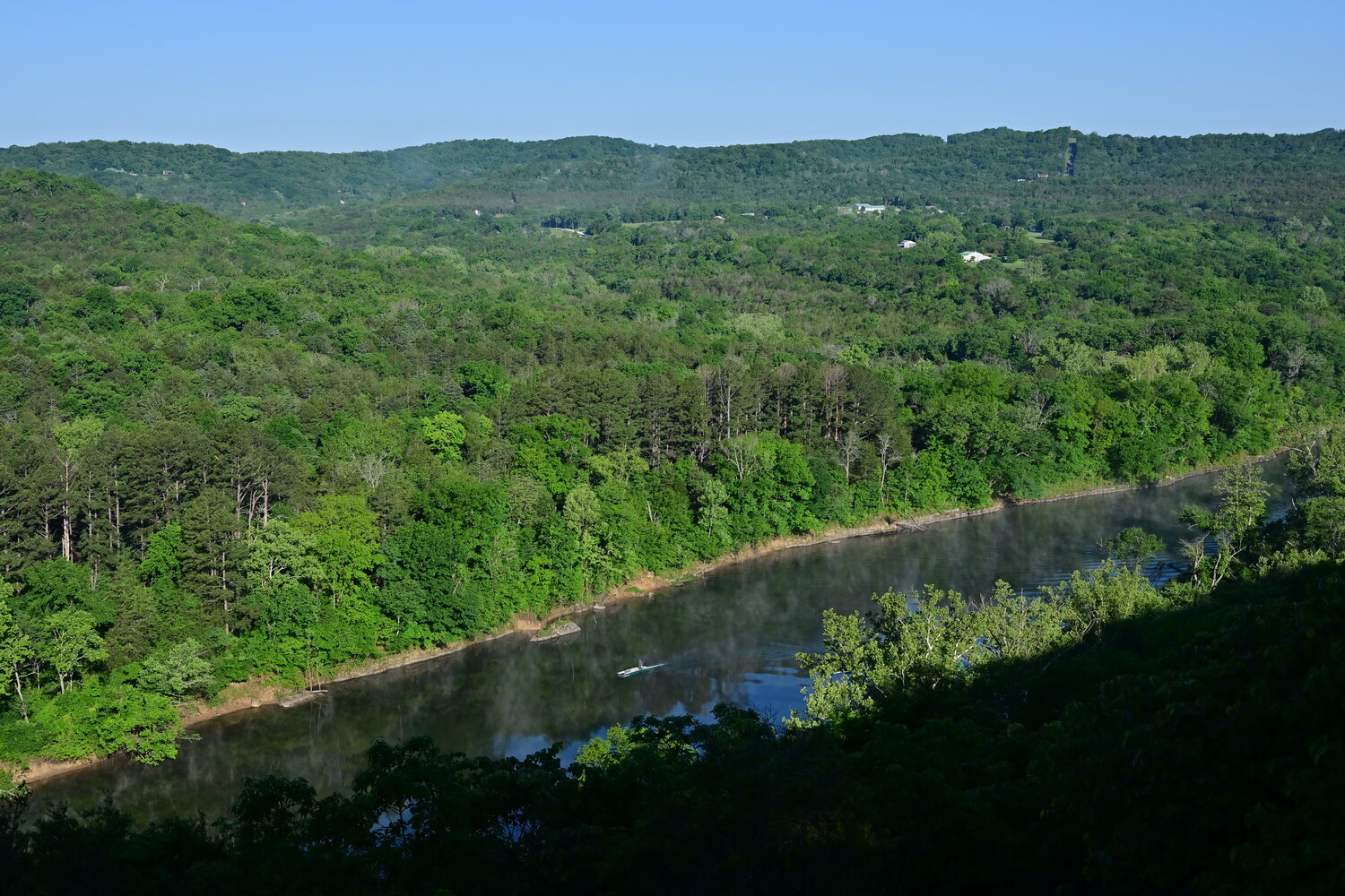 Sweeping view of the White River valley from the limestone bluff at White River Cabins